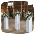 Prop Hire Bucks white acrylic plinths for flower arrangements and wedding displays. Available in Buckinghamshire, Bedfordshire, Northamptonshire and Oxfordshire.