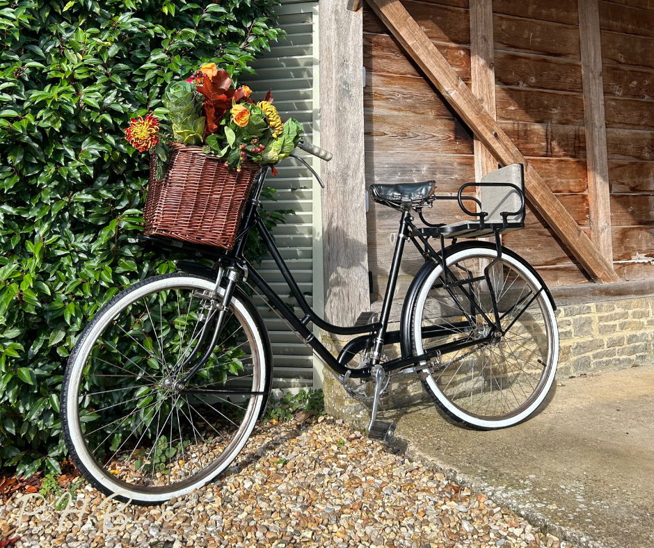 Vintage BSA Bicycle as a wedding prop hire with flowers